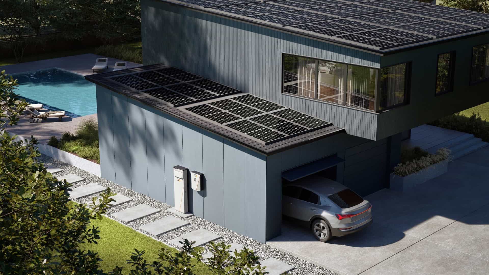 Image of house with solar panels on roof, with Generac PowerCell Battery Backup Power cabinet on the side of the garage.